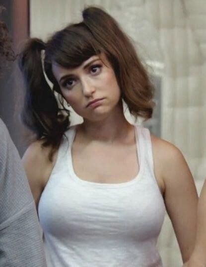 Check out these sexy pics of the stunning Milana Vayntrub, flaunting her big titties like it's nobody's business. This actress knows how to rock some provocative outfits and show off her main asset - the biggest natural boobs in modern Hollywood!